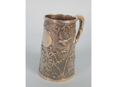 A Chinese silver christening mug