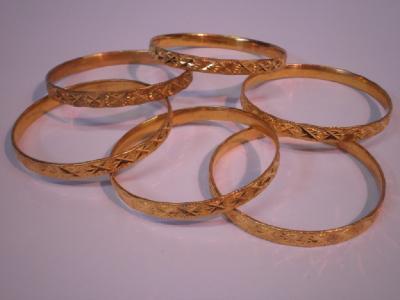 A set of six Indian wedding bangles