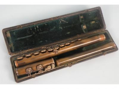 A 19thC simulated ebony or ebonite flute by Rudal of London