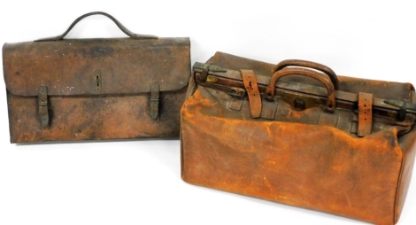 A leather Gladstone bag, the lock stamped English Secure Lever, 59cm wide, (AF), and a leather satchel. (2)