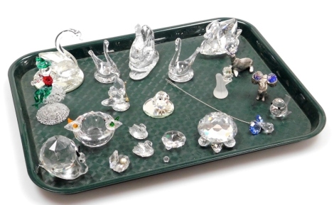 A group of Swarovski crystal animals, to include swans, and other similar pieces, and further crystal ornaments. (a quantity)