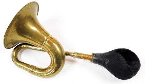 A vintage brass car horn with rubber bulb, 38cm long.