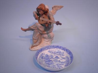 A Lladro pottery figure of a Angel playing a mandolin