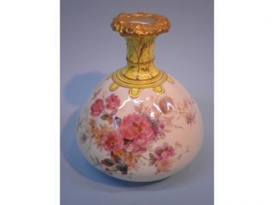 A Royal Crown Derby bottle shape vase painted with flower sprays