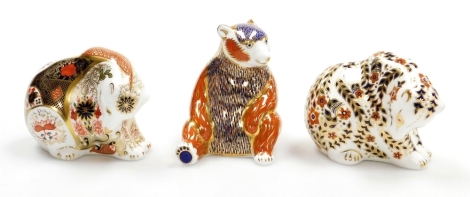 Three Royal Crown Derby bear paperweights, Honey Bear, with gold stopper, 10cm high, Rocky Mountain Bear, an Exclusive Signature edition of 500 for Goviers for Sidmouth, designed by Sue Rowe, with gold stopper, 8cm high, and Russian Bear, with gold stopp