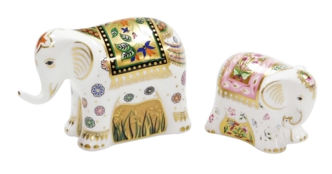 Two Royal Crown Derby baby elephant paperweight, Ravi infant boy elephant, 12cm wide, and Rupa baby girl elephant paperweight, 8cm wide, both exclusively commissioned by Goviers of Sidmouth, limited edition number 405/1250, with gold stoppers and gold pri