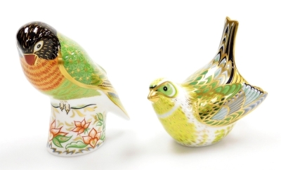 Two Royal Crown Derby bird porcelain paperweights, Black Faced Love Bird, limited edition number 577/2500, 10cm high, and Greenfinch, 9cm high, both with gold stoppers and red printed marks to underside, boxed.