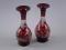 A pair of Bohemian type ruby tinted vases