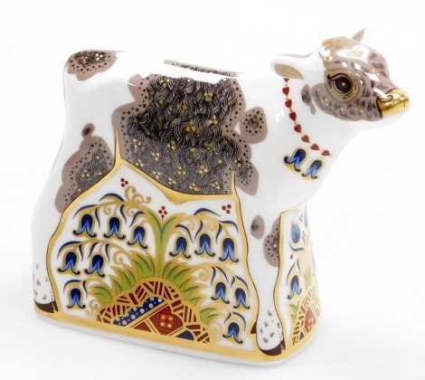 A Royal Crown Derby Bluebell Calf porcelain paperweight, with gold stopper and red printed marks to underside, 11cm high, boxed.