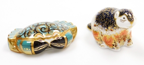 Two Royal Crown Derby porcelain paperweights, Cromer Crab, one of an edition with limited availably to December 2002, with gold stopper and red printed marks to underside, 13cm wide, and Riverbank Beaver, limited edition number 2761/5000, with gold stoppe