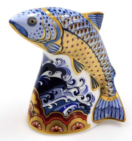 A Royal Crown Derby Leaping Salmon porcelain paperweight, an Exclusive to Sinclairs, limited to a twelve month period of 1st June 2005 - 31st May 2006, with gold stopper and red printed marks to underside, 15cm high, boxed with certificate.