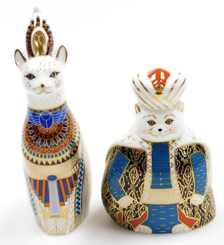 Two Royal Crown Derby Royal Cats porcelain paperweights, Egyptian and Persian, with red printed marks to underside, and no stoppers, 23cm and 16cm high respectively, boxed. Auctioneer announce made without stoppers (not lacking)