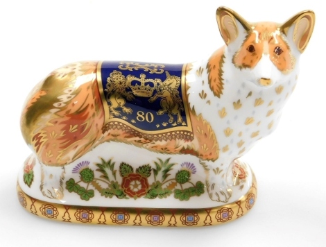A Royal Crown Derby The Royal Windsor Corgi porcelain paperweight, commissioned by Peter Jones of Wakefield to commemorate the 80th Birthday of Her Majesty Queen Elizabeth II, limited edition of 950, with gold stopper and red printed marks to underside, 1