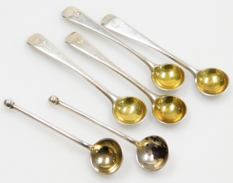 A set of four Victorian Old English pattern silver mustard spoons, with silver gilt bowls, initialled, Josiah Williams & Co, London 1896, 1oz, and a pair of Victorian silver salt spoons, London 1889 and 1890, 1¼oz.