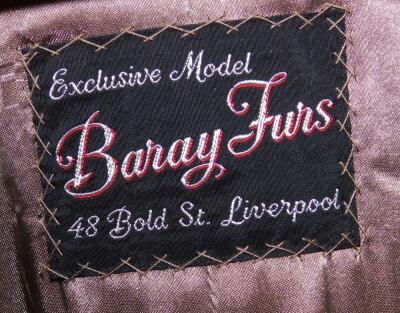 A Baray Furs full length pale mink fur coat, silk lined, together with a ladies black and gold shawl with tasselled end. - 2