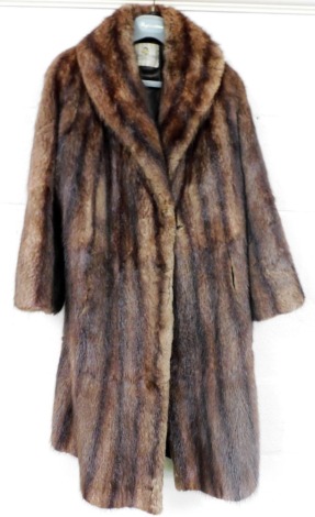 A Dickins and Jones full length mink fur coat, with silk lining.