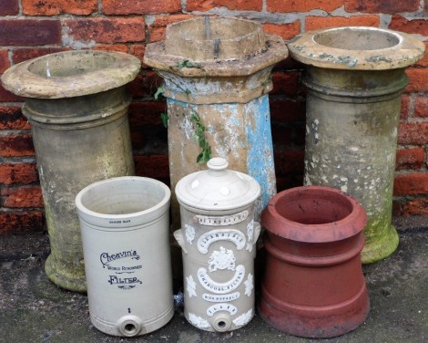 A quantity of reconstituted stone chimney pots, 66cm high, 67cm high, 75cm high, a terracotta chimney stack, 32cm high, and two stoneware type jars, one for the improved cleansable charcoal filter with moveable plate (AF), 46cm high.
