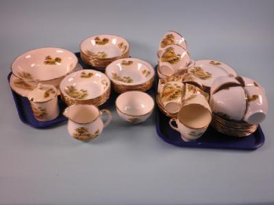 An Alfred Meakin part tea and dinner service printed with rural scenes