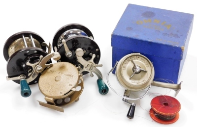 Four fishing reels, comprising an Omnia fixed spool reel with original box, two Penn number 85 Bakelite multiplier reels, and a Wey Mark II alloy centrepin reel.