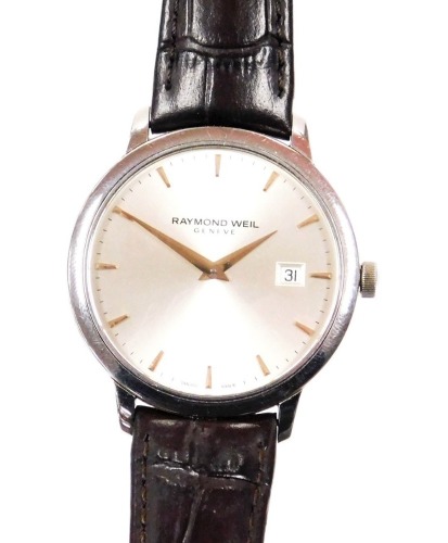 A Raymond Weil stainless steel wristwatch, with silvered coloured dial and gold coloured markers, with date aperture, numbered 5488-XO41289, on a brown leather strap, the dial 3.5cm wide, boxed.