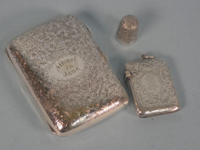 A Victorian and later silver cigarette case engraved with flowers inscribed Albert to Jane