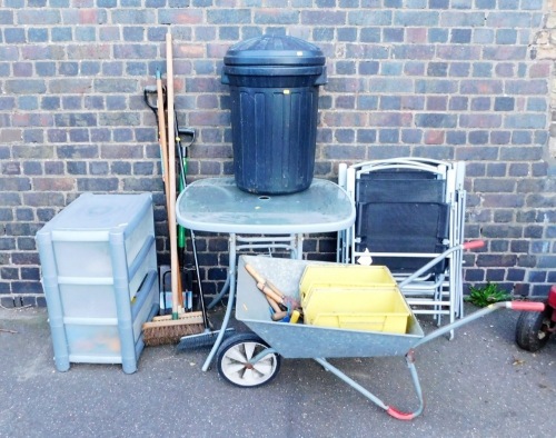 A garden glass top table, and three associated chairs, plastic garden bin, various brushes, wheelbarrow, etc. (a quantity)