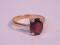 A garnet set dress ring