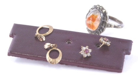 A group of jewellery, to include a pair of 9ct gold drop earrings, a pair of garnet and cz set floral cluster earrings and a silver and marquette set dress ring, stamped sterling. (3)