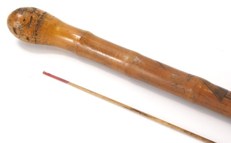 A 20thC metamorphic Chinese bamboo walking stick, the interior with a fishing rod of articulated form, 84cm high.