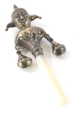 An early 20thC child's teething rattle, Joker and bell top, marked sterling.