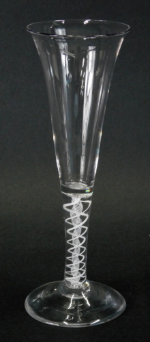 An 18thC champagne flute or glass, with spiral air twist stem on inverted foot, 20cm high.