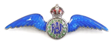 A 20thC enamel RAF sweetheart brooch, centred by a crown, with blue enamel wings marked silver, with a plain pin back, 6cm wide.