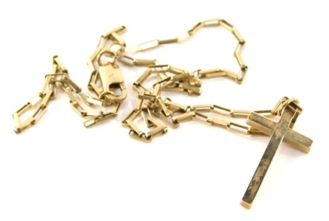 A 9ct gold crucifix pendant and chain, the crucifix of plain design with makers stamp AC & Co, 3cm high, on an elongated 9ct gold box link chain, 48cm long, 7.6g.