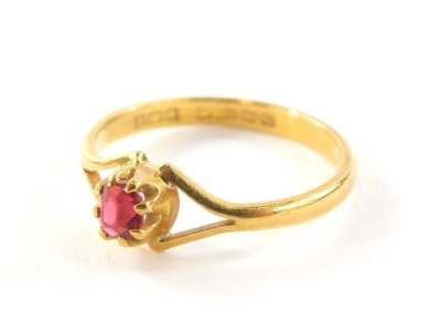 A 22ct gold wedding band, converted to a dress ring and set with ruby in claw setting with V splayed shoulders, ring size M½, 2.7g all in.