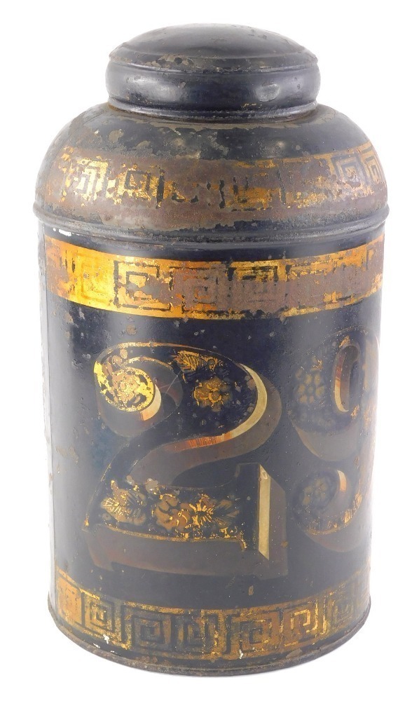 A 19thC toleware tea canister, with a Greek key style banding, numbered 29, with lid, 37cm high.