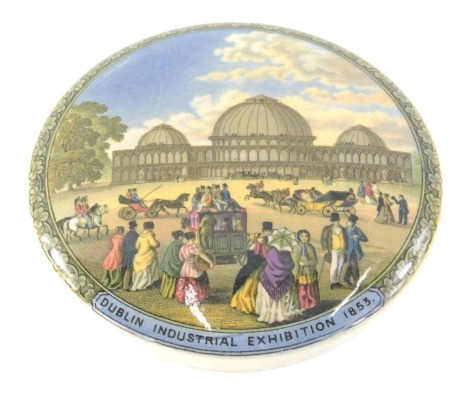 A 19thC Prattware pot lid, Dublin Industrial Exhibition 1853, transfer printed and polychrome decorated, 13cm diameter.