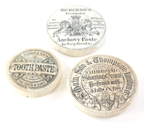 A Burgess Genuine Anchovy Paste black and white transfer printed pot lid, 9cm diameter, another Thompson and a further toothpaste lid. (3)