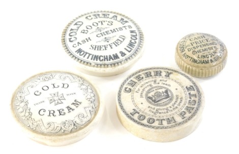 A black and white transfer printed cherry toothpaste pot lid, 7cm diameter, another cold cream, a Boots pure cash dispensing chemist lid and another for Boots Cold Cream, Nottingham and Lincoln. (4)