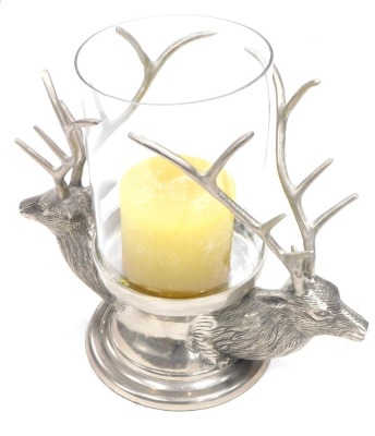 A silvered metal Stags head lamp, with cylindrical shade on stepped base, 38cm high.