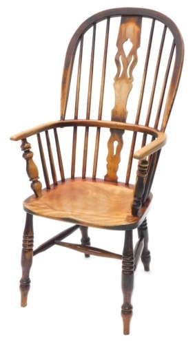 A 19thC ash and elm Windsor chair, with a pierced splat, solid seat, on turned legs with H stretcher.