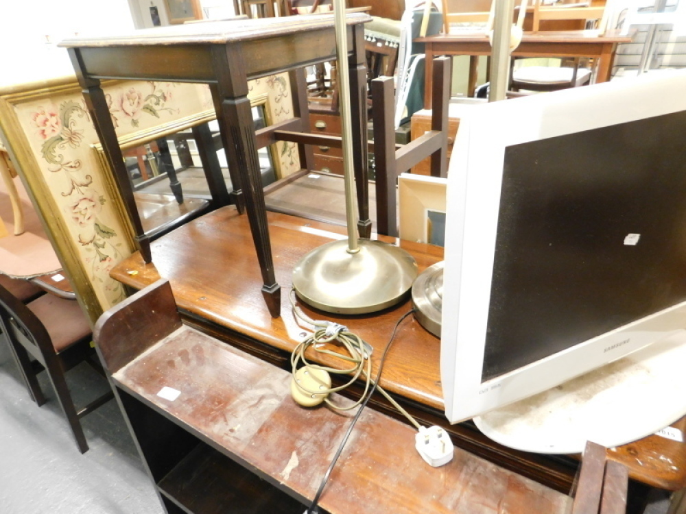 An Ercol type oak dresser base, the rectangular top with rounded ends, above two frieze drawers