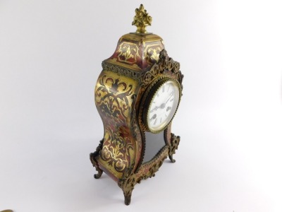 A French late 19thC Boulle mantel clock, the circular dial enamel dial signed Bright a Paris, and bearing Roman numerals, with Japy eight day movement striking on a bell, the case of balloon form, with pendulum and key, 31cm high, 16cm wide, 9cm deep. - 16