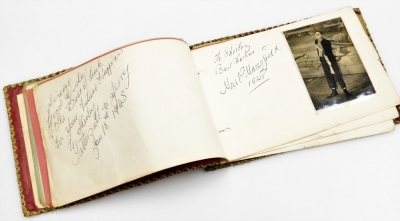 An autograph book bearing various signatures of Manchester United FA cup winners, to include Jack Crompton, Allenby Chilton, Henry Cockburn, Stan Pearson, players from the Manchester City 1947-48 season squad, Andy Black, Roy Clarke, Joe Fagan, Kimmy Munr - 13