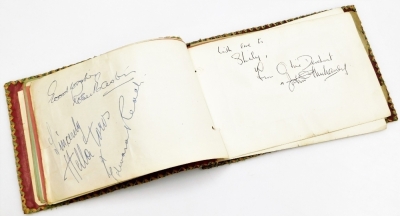 An autograph book bearing various signatures of Manchester United FA cup winners, to include Jack Crompton, Allenby Chilton, Henry Cockburn, Stan Pearson, players from the Manchester City 1947-48 season squad, Andy Black, Roy Clarke, Joe Fagan, Kimmy Munr - 14