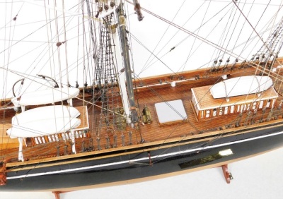 A wooden scale model of The Cutty Sark, three masted clipper complete with lifeboats, rigging, etc., wooden cased with brass plaque, the case 120cm wide. - 12