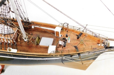 A wooden scale model of The Cutty Sark, three masted clipper complete with lifeboats, rigging, etc., wooden cased with brass plaque, the case 120cm wide. - 13