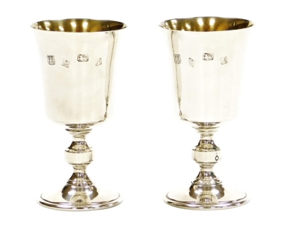 A pair of Elizabeth II silver goblets, with a plain bowl and knopped stem, Birmingham 1975, by Barker Ellis Silver Co, 9¾oz, 13cm high. - 5