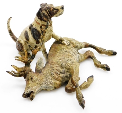 A late 19th/early 20thC cold painted bronze animalier group, in the manner of Bergman, modelled in the form of a hound with paw raised over a recumbent stag, bears possible signature, 10cm high, 18cm wide. - 9