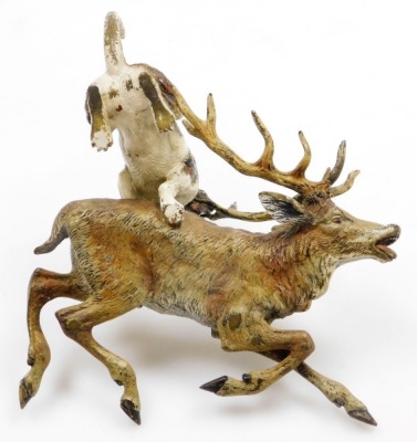 A late 19th/early 20thC cold painted bronze animalier group, in the manner of Bergman, modelled in the form of a hound with paw raised over a recumbent stag, bears possible signature, 10cm high, 18cm wide. - 10