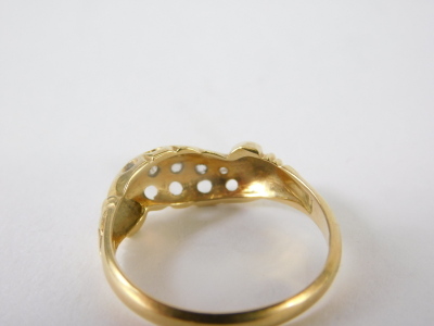 An 18ct gold dress ring, inset with tiny diamonds, 2.4g all in, size M. - 4